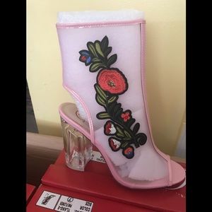 Ladies pink peep toe translucent heels with design